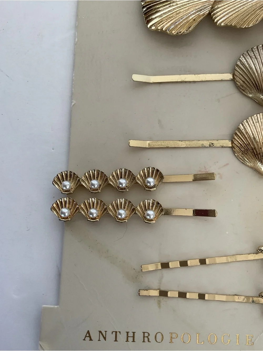 Anthropologie Gold she’ll hair clips NWT